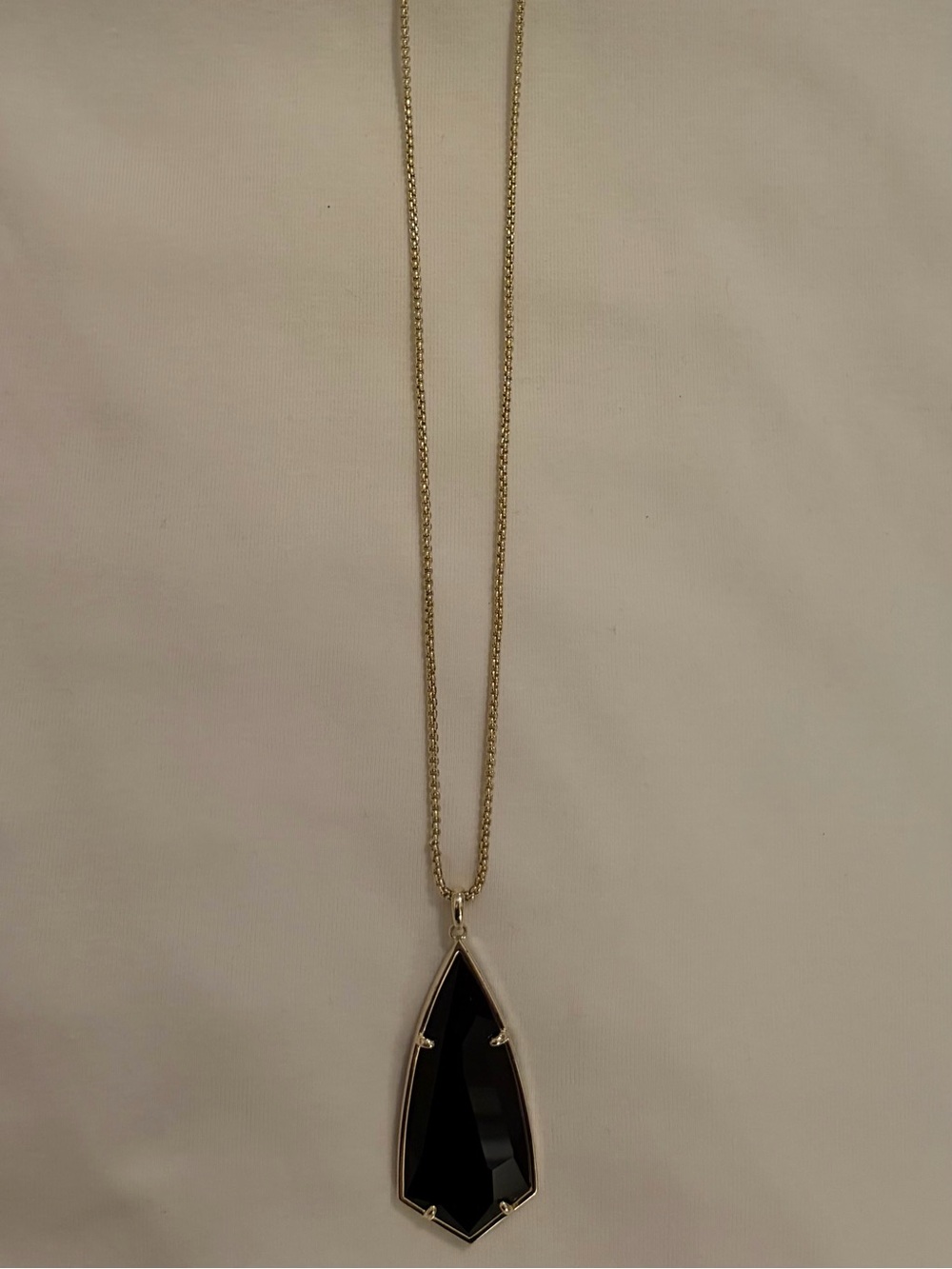 Kendra Scott pendant necklace teardrop-shaped black onyx stone in gold-tone